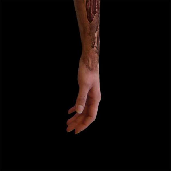 A person's arm on a black background